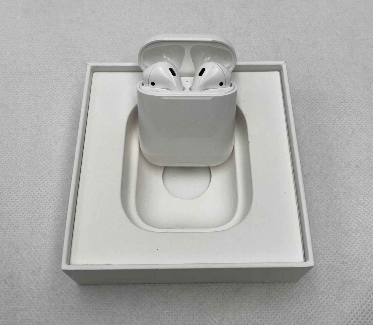 thumb Słuchawki bezprzewodowe douszne Apple AirPods 2. gen białe (Używany)