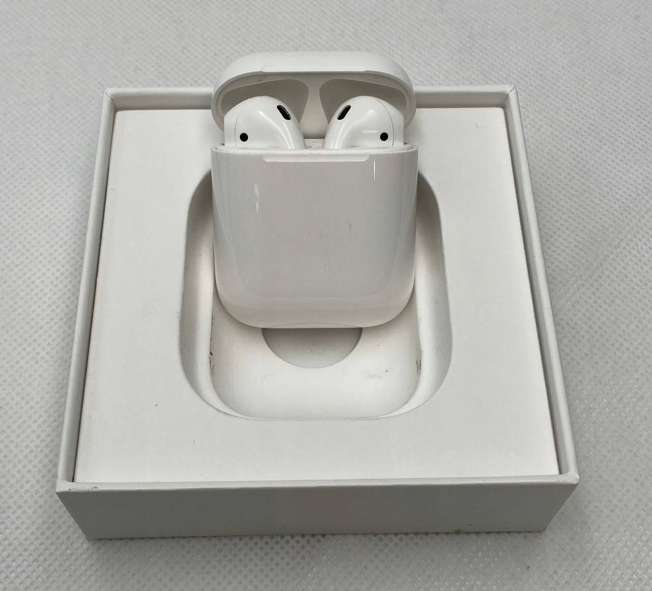 thumb Słuchawki bezprzewodowe douszne Apple AirPods 2. generacji (Używany)